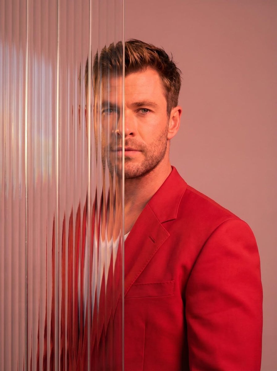Editorial Portrait Red Blazer Glass Panel Distortion