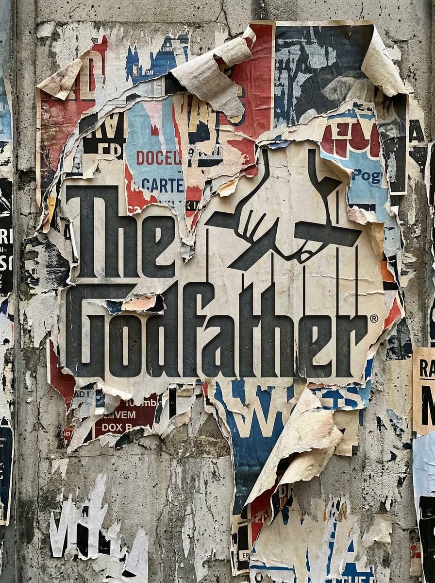 Logo Revealed In Torn Posters Urban Wall